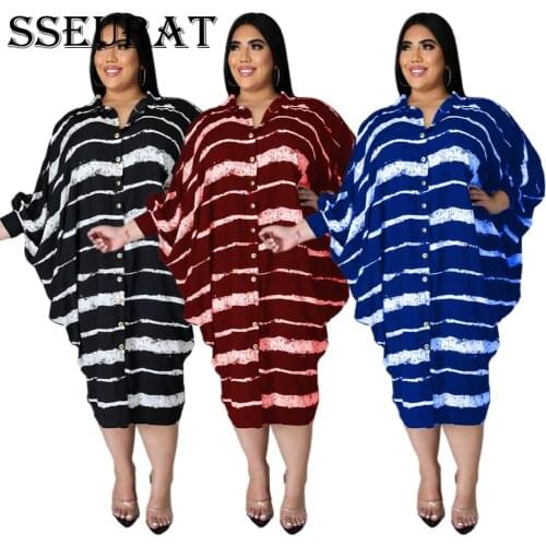 SSEURAT Plus Size Ladies Printed Long Sleeve Button Irregular Swing Dress Fashion Autumn Outfits