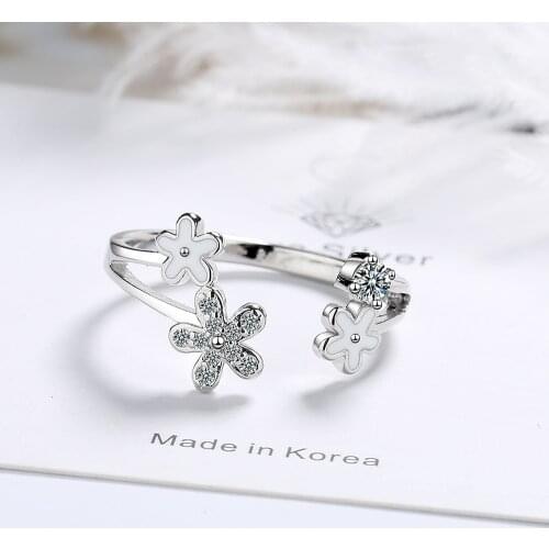 Dripping glaze white small flower open ring temperament gentle sen style ins wind flashing zirconium daisy ring female