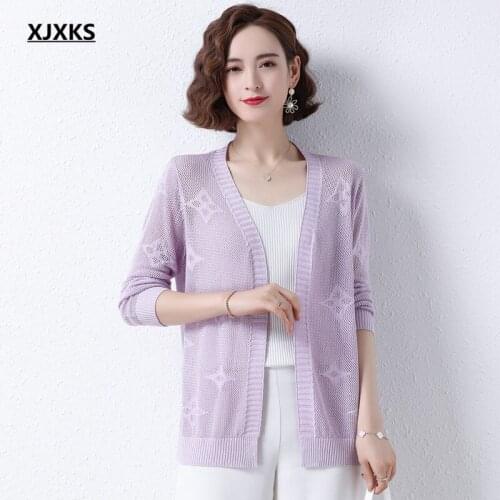 XJXKS 2021 summer new fashion hollow women sun protection clothing high-quality knitted thin sweater women cardigan