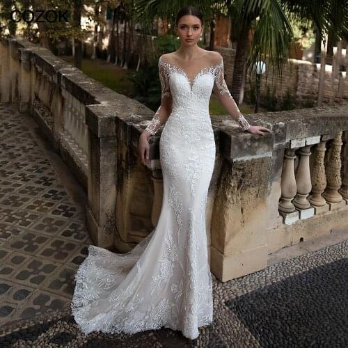 Elegant Ivory Champagne Wedding Dresses Mermaid V-Neck Lace Appliques New Arrival Long Sleeves Trumpet Bridal Gown Plus Size