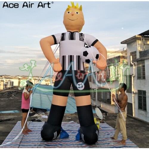3m H sports Athletes model inflatable soccer player,sports man with a football in arms standing for sale