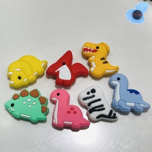50pcs Wholesale PVC Cartoon Dinosaur Children Shoes Accessories Garden Shoe Decorations Fit Backpack Croc Jibz Charm