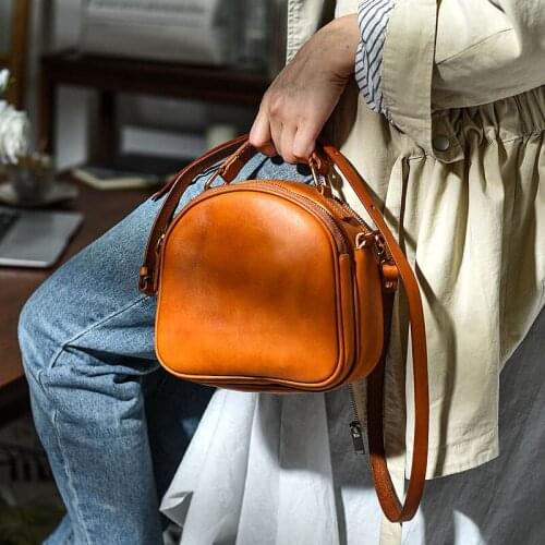 Retro simple womens genuine leather shoulder small round bag head layer cowhide double zipper womens shoulder messenger bag
