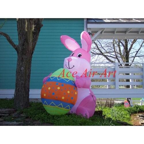 Outdoor bueatiful inflatable bugs taking an Egg for Easter Events