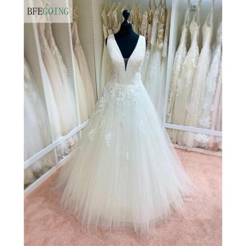 Ivory Lace Tulle Sleeveless V-Neck Floor-Length Bridal Gowns A-Line Wedding Dresses Chapel Train Custom Made