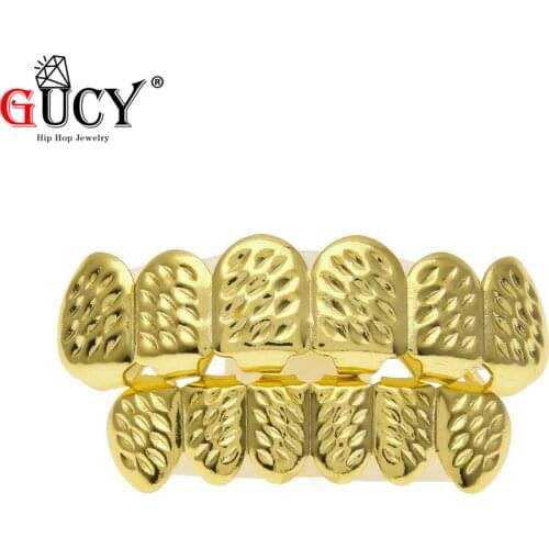 GUCY Convex Shape Gold Color Plated HIP HOP Teeth Grills D-Cut Top & Bottom Grillz Set With silicone Vampire teeth Grill. Gift
