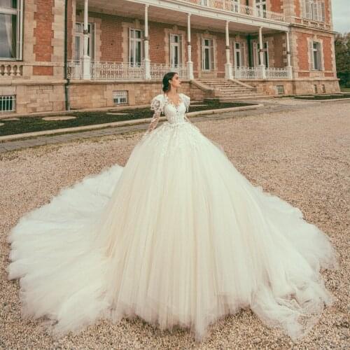 Luxury Wedding Dress Sexy Beaded Lace Appliques Ball Gown Weddig Dresses Custom Made Jewel Neck Long Sleeves Bridal Gowns
