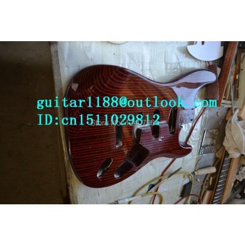 Free shipping new electric guitar body with zebra wood body made in China 1830