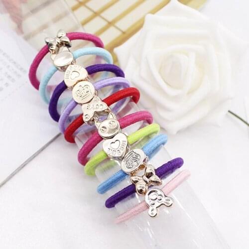 100bag 100pcs/bag rubber ring Korean hair flower hair black leather rubber rope headwear