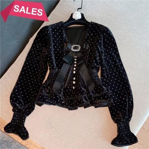 Winter new style foreign style celebrity V-neck thin bow stamping bubble sleeve VELVET TOP