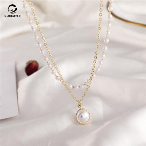Cold wind double-layer pearl necklace Female INS Tide Light luxury niche design Temperament simple clavicle chain necklace 068