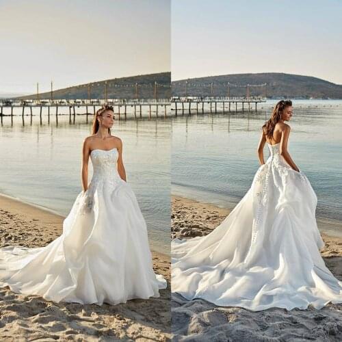 2021 Wedding Dresses Sweetheart Appliques Lace A Line Bridal Gowns Custom Made Sexy Backless Sweep Train Beach Wedding Dress