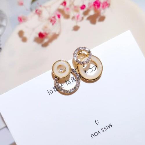 Korean style fashion temperament simple wild circle dripping oil earrings female net red small jewelry
