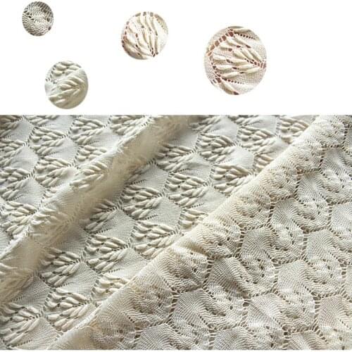Knitted lace fabric soft autumn clothing fabric light yellow air bubble cloth foreign trade order