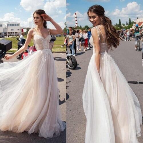 2020 A Line Wedding Dresses Spaghetti Straps Lace Appliques Bridal Gowns Sexy Lace-up Back Sweep Train Beach Wedding Dress
