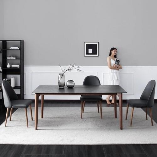 Black walnut Italian minimalist light luxury Nordic rock plate solid wood dining table 6 people simple modern