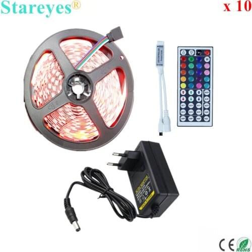 Free Shipping 10 sets 5M 300 LED SMD 5050 RGB strip DC12V Flexible Non Waterproof Strip light with IR Remote + 5A Power Adapter