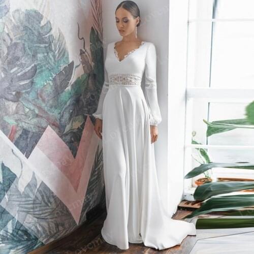 A Line Bohemian Wedding Dresses 2021 V Neck Long Sleeves Lace Applique Sweep Train Boho Open Back Beach Bridal Dresses