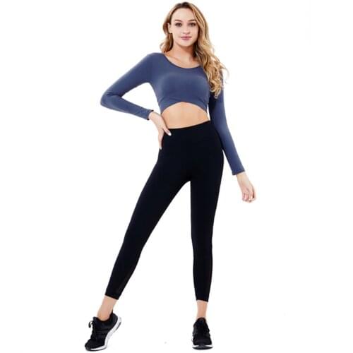 Autumn Europe and the United States new yoga suit sports fitness high elastic solid color shoulder strap long sleeve two sets