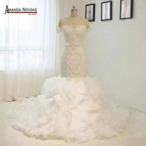 Off the shoulder short sleeves heavy shinny beaded bodice mermaid wedding dress luxury