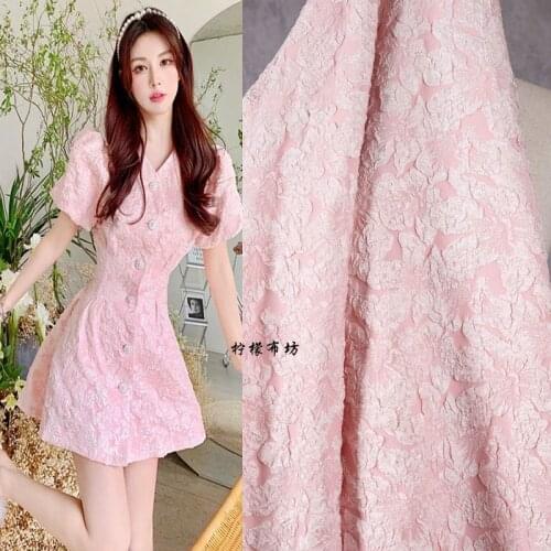 Pink embossed jacquard fabrics full of flower texture concave convex bubble clothing fabric dress shirt creative designer fabric