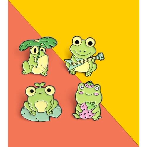 The Frog Family Enamel Pin Frog holding strawberry and playing piano Brooches Bag Lapel Pin Badge Jewelry Gifts for Kids Friends