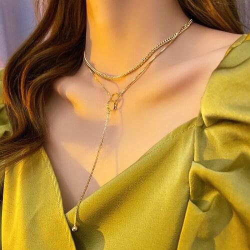 Korean version of the long double-layered necklace niche womens double-ring clavicle chain, simple and trendy tassel necklace