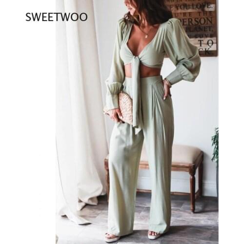 2021 spring and summer new ladies skirt suit sexy lace-up waist casual suit holiday style loose two-piece suit