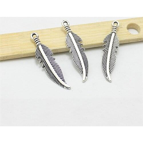 Sweet Bell 100pcs 7*27mm Antique Zinc Alloy Feathers Charms Diy Jewelry Findings Jewelry Accessories wholesale D1171