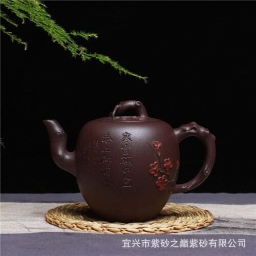 Wholesale authentic yixing famous manual recommended beauty cold shoulder teapot 250 ml of pure manual plum flower pot