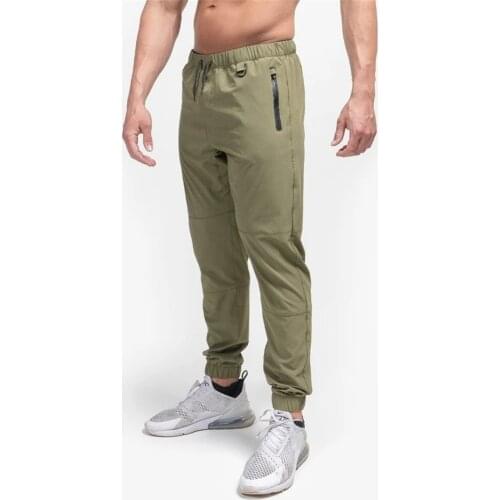 2021 NEW men Gym Sweatpants Zip pocket Running Skinny training Trousers Male Fitness Workout Pencil pants Joggers Pants