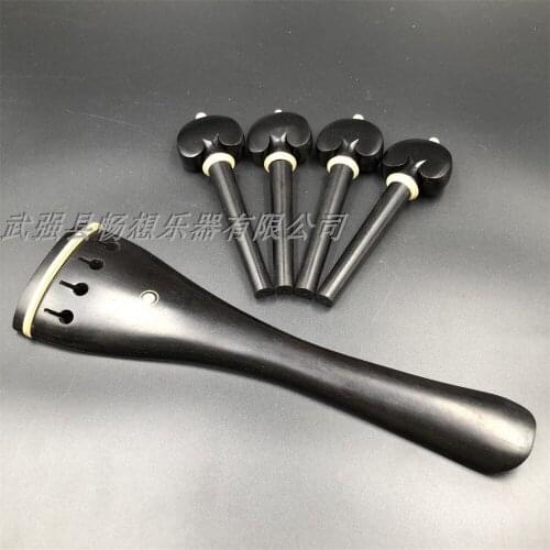 One set of ebony inlay Paris eye cello tailpiece and 4pcs cello pegs