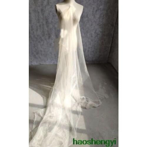 High quality new streamer yarn fabric, beige hazy gauze yarn perspective fashion wedding dress fabric