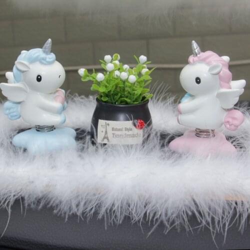 Unicorn car ornaments car spring doll shaking head ornaments cute unicorn car ornaments