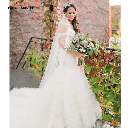 Lovely Mermaid Wedding Dresses 2021 Sleeveless Bridal Gown Backless Sweetheart Chaple Train Beading White Plus Size Bride