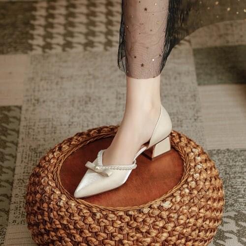 Baotou sandals womens summer mid-heel 2021 new fashion pointed pearl sexy fairy style thick heel hollow shoes women