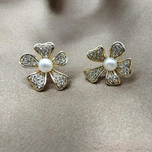 2021 new zircon flash flower 925 silver needle cold wind temperament womens Japanese and Korean version personalized earrings