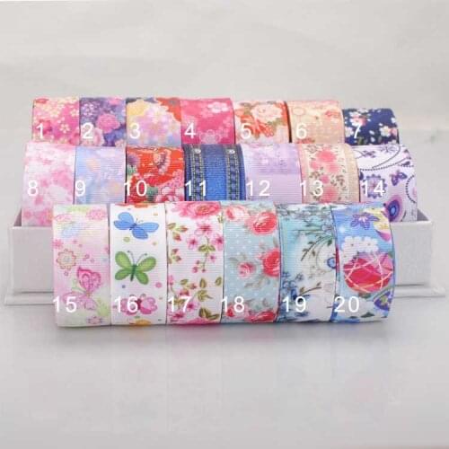 Free shipping 22 /25mm hot selling beautiful flower printed grosgrain ribbon gift DIY hairbow