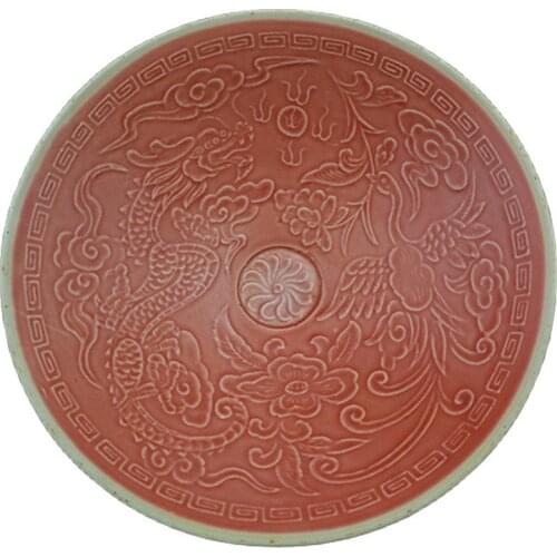Early collection of antique Song Ding kiln carved pink dragon and phoenix bowl and plate ornaments