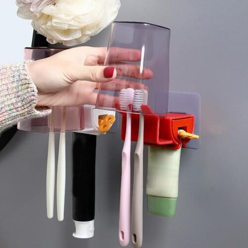 Wall Mount Toothpaste Toothbrush Storage Rack Facial Cleanser Squeezer Dispenser