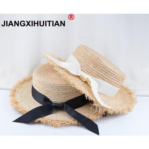 2018 New summer bow 100%Raffia hat Temperament flat Straw hats Womens Sea beach vacation leisure sunscreen hat