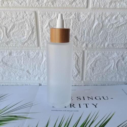 Wholesale Custom logo Frosted Clear Glass Cream Jar Cosmetic Toner Bottle With Bamboo Wood Lid Skin Care Container Packaging 5oz