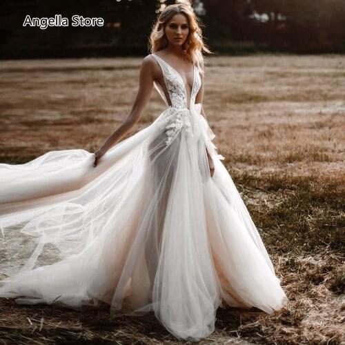 Sexy Backless Long Puffy Tulle Wedding Dresses Summer Illusion Sleeveless Deep V Neck Beach Boho Bridal Gowns Robe De Mariage