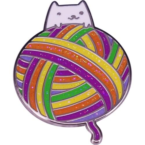 Little kitty Hiding behind a giant glitter rainbow candy yarn ball and ready to shred it enamel pin Wool Ball brooch