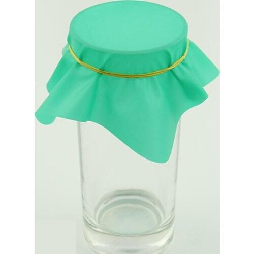 Pena Coin thru rubber sheet, coin into cup - magic trick, stage magic