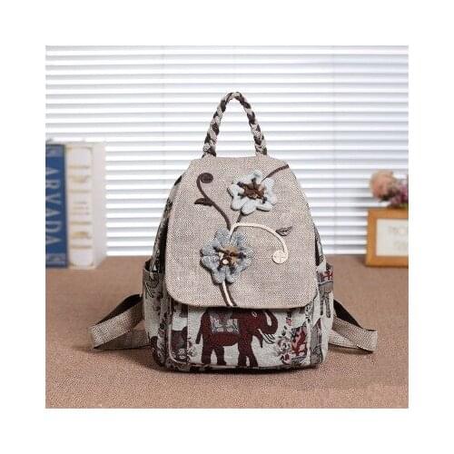 Fashion national string appliques women shopping backpacks!Nice animal emsbossing lady Cover backrack All-match canvas backruck