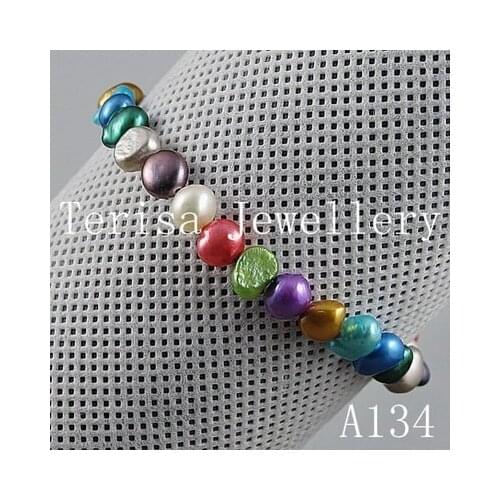 Wholesale New color Grade AA .Pearl size 6-7mm. Length7.5inch,mix color Natural Fresh Water Pearls Elastic Bracelet