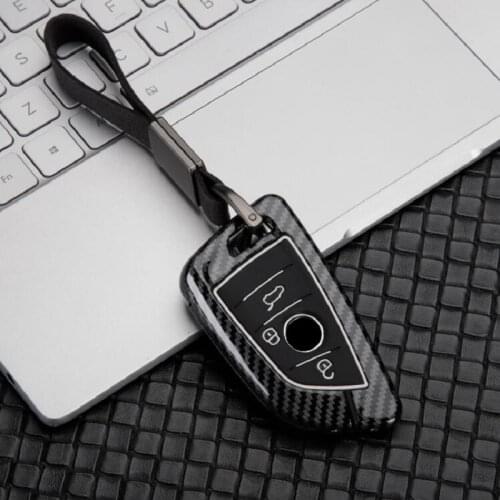 Carbon fiber Alloy+Silicone Car Remote Smart Key Case Fob Cover For BMW X1 X5 X6 F15 F16 F48 BMW 1 / 2 Series blade KeyChain
