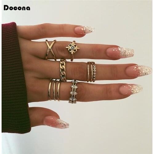 Docona 8pcs/sets Bohemia Luxurious Gold Color Finger Rings Hollow Flowers Geometric Clear Crystal For Women Men Party Gift 7051