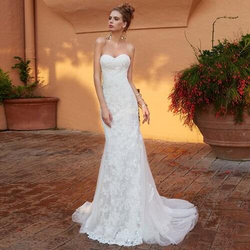 Sexy Lace Tulle Strapless Mermaid Wedding Dresses 2021 Sweep Train Appliques Sleeveless Backless Bridal Gowns